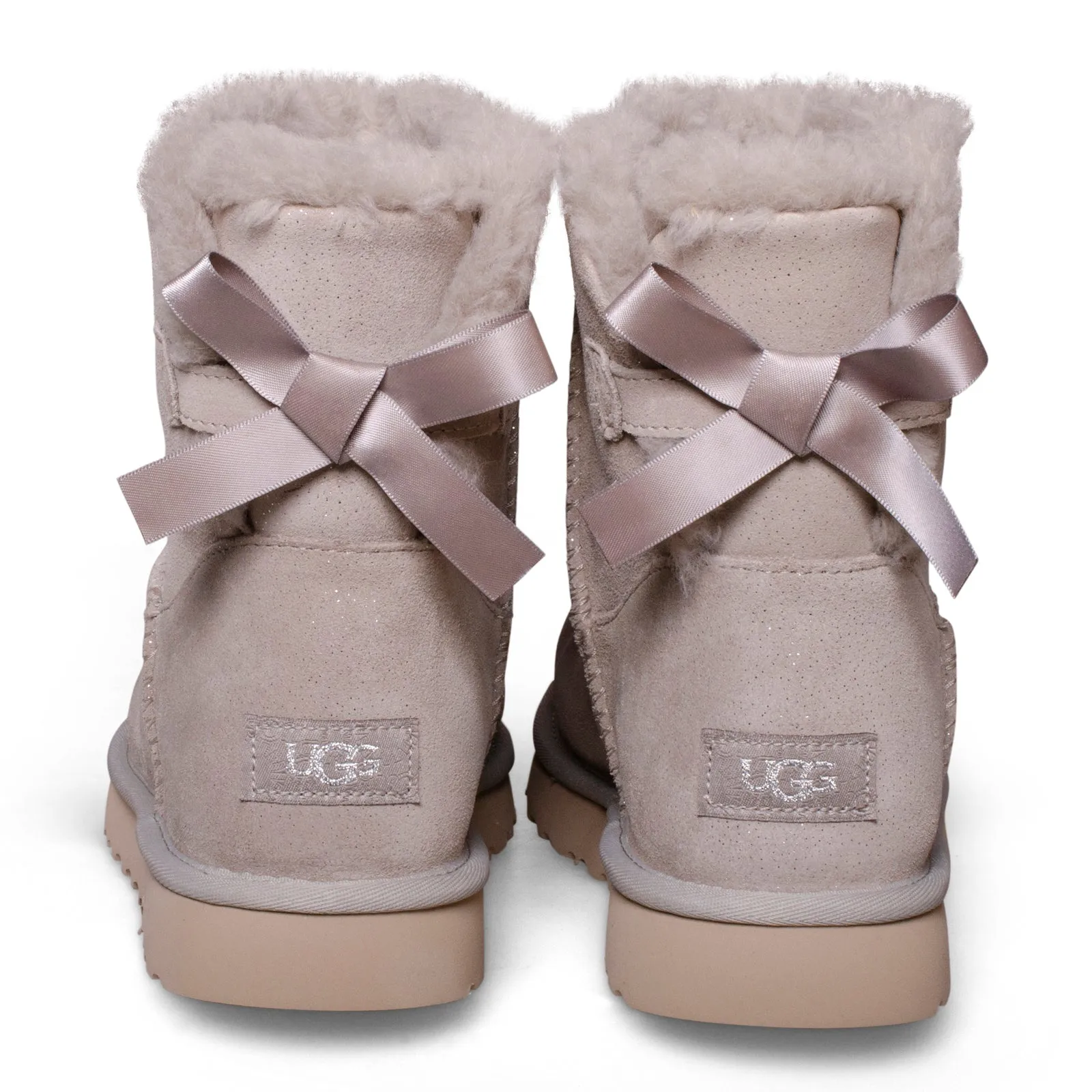 UGG Mini Bailey Bow Twinkle Goat Boots - Women's